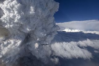 An F-15C fighter jet captured an image of a giant pyrocumulus cloud rising above a wildfire in northern California.
