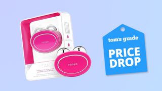 The Foreo Bear Microcurrent Facial Device on a blue background with a price drop tag