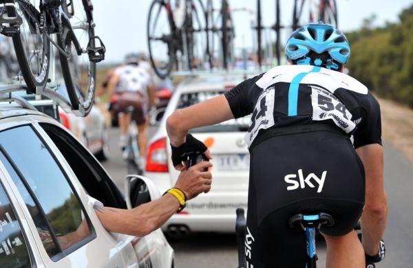 Mat Hayman (Team Sky) grabs some refreshment from the team car