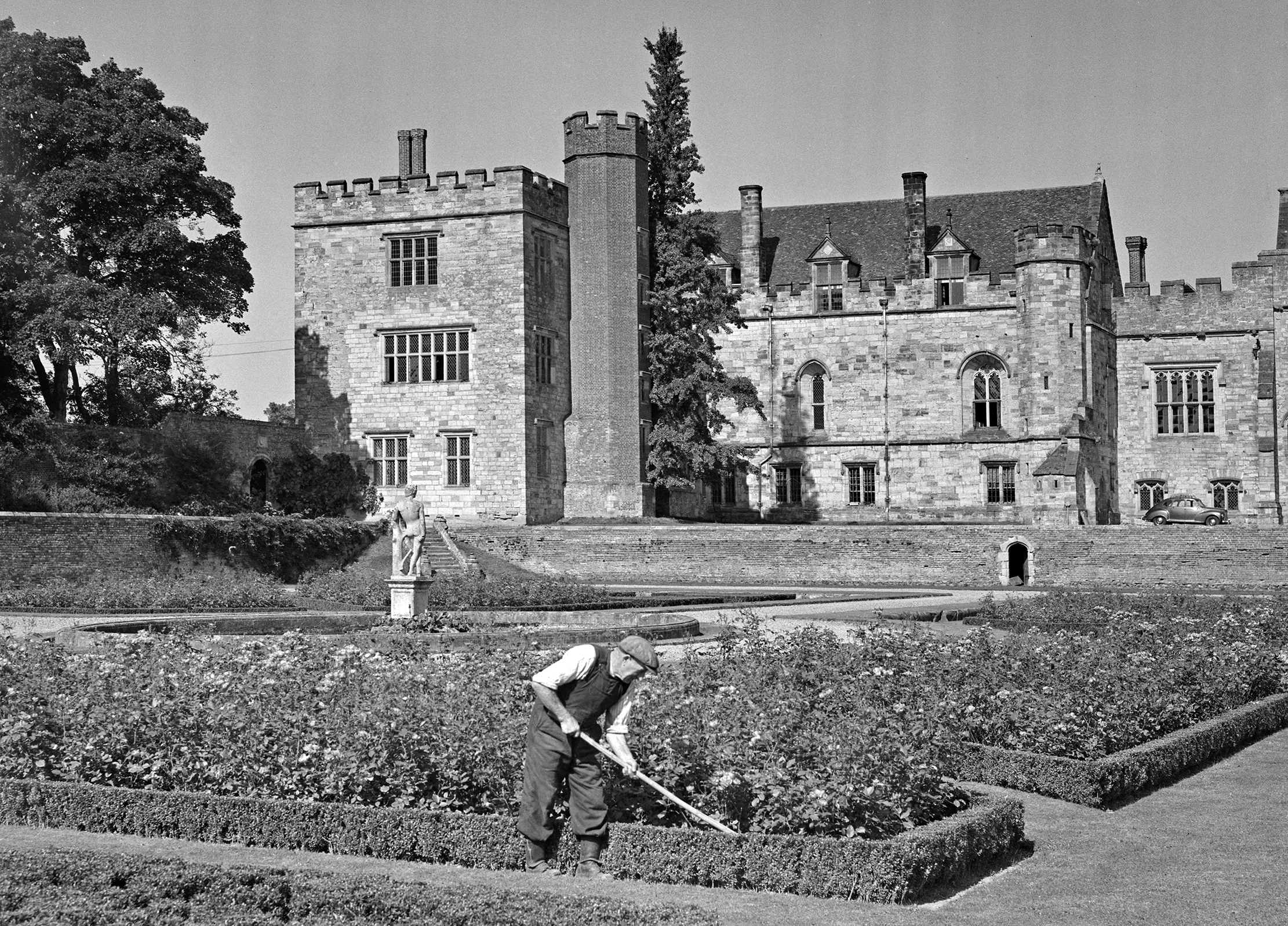 A gardener working in the Italian Garden at Penshurst Place, the ancestral home of the Sidney family in Kent, September 23rd 1953.