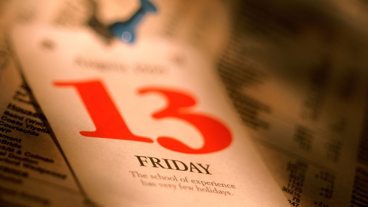 We see a close up of a calendar sheet that says Friday the 13th.