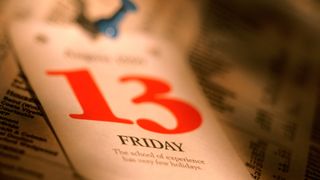 We see a close up of a calendar sheet that says Friday the 13th.