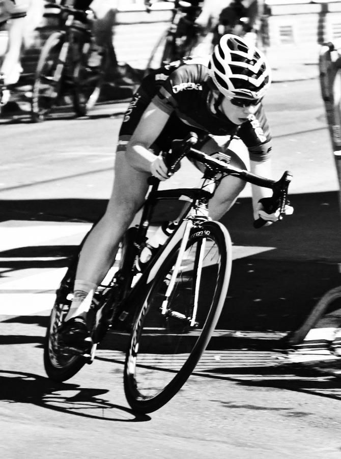 Amy Cutler (FCS|Zngine p/b Mr Restore) rounds the third corner of eight on this technical crit
