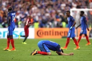 France players look dejected after losing the final of Euro 2016 to Portugal at the Stade de France.