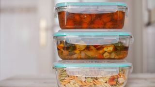 Batch cooking containers with food in