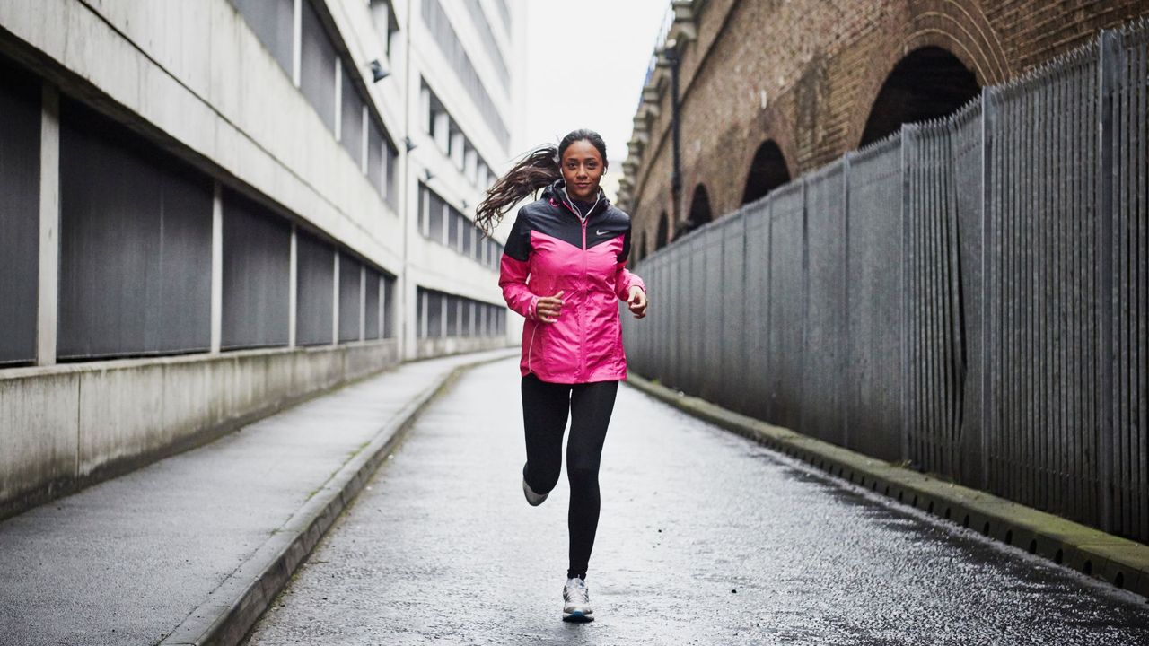 A woman running through an urban area