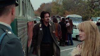 Tom Hanks on the left speaks to Robin Wright before she boards a bus in Forrest Gump