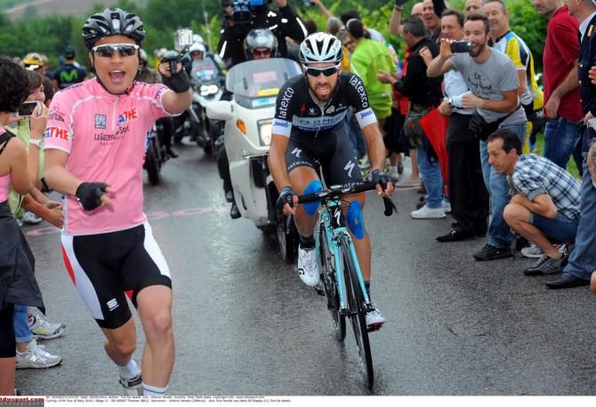 Thomas De Gendt (Omega Pharma-Quick Step) and a running maglia rosa