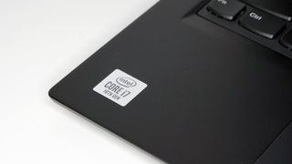 The Intel i7 10th Gen processor logo sticker on the Lenovo ThinkPad X390 against a white background