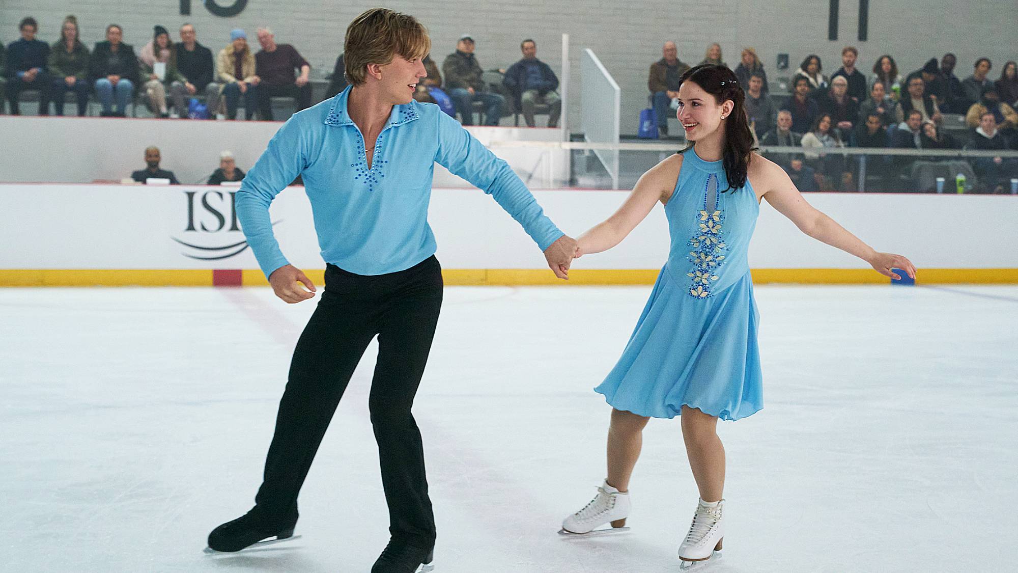 Cale Ambrozic as Brayden Elliot and Madelyn Keys as Adriana Russo in "Finding Her Edge" on Netflix