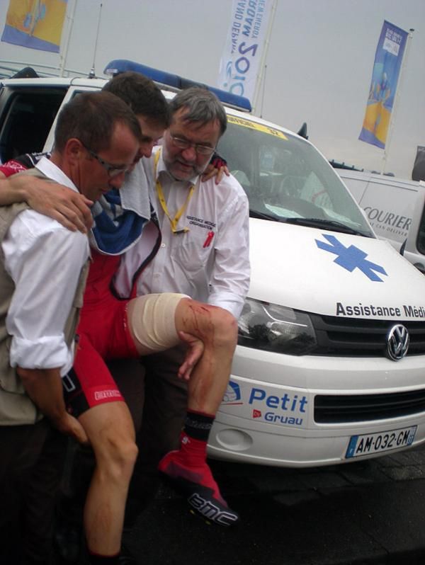 Mathias Frank (BMC Racing Team) gets medical treatment after his prologue crash.