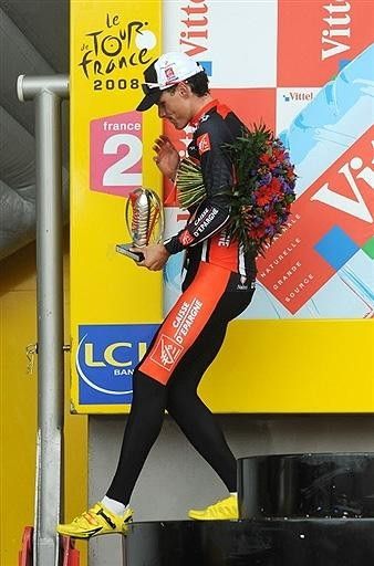 Exit stage left: today's winner makes his way to the post-race press conference.