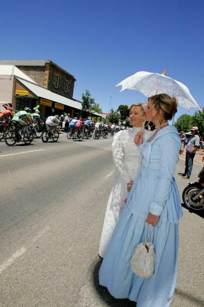 These lovely ladies watch the peloton pass on stage one
