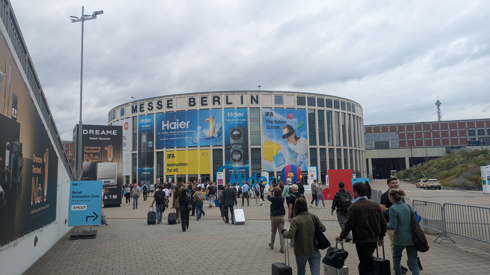 People walking towards Messe Berlin, a large conference centre