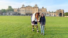 Georgie Driver, groom to Gemma Stevens, with Gemma&rsquo;s ride Chilli Knight in front of Badminton House during the 2026 event.