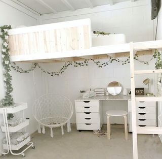 White lofted bed with white desk