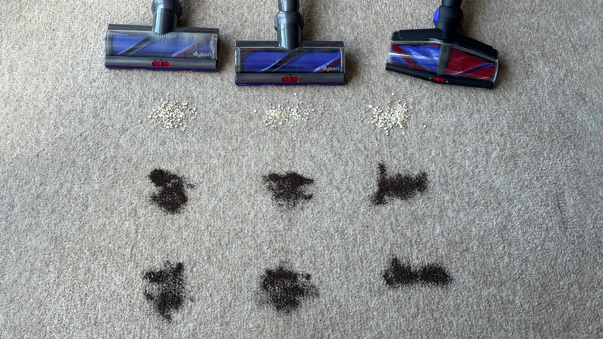 Dyson V16 Piston Animal, Gen5detect, V15 Detect with piles of tea and oats in front of them 