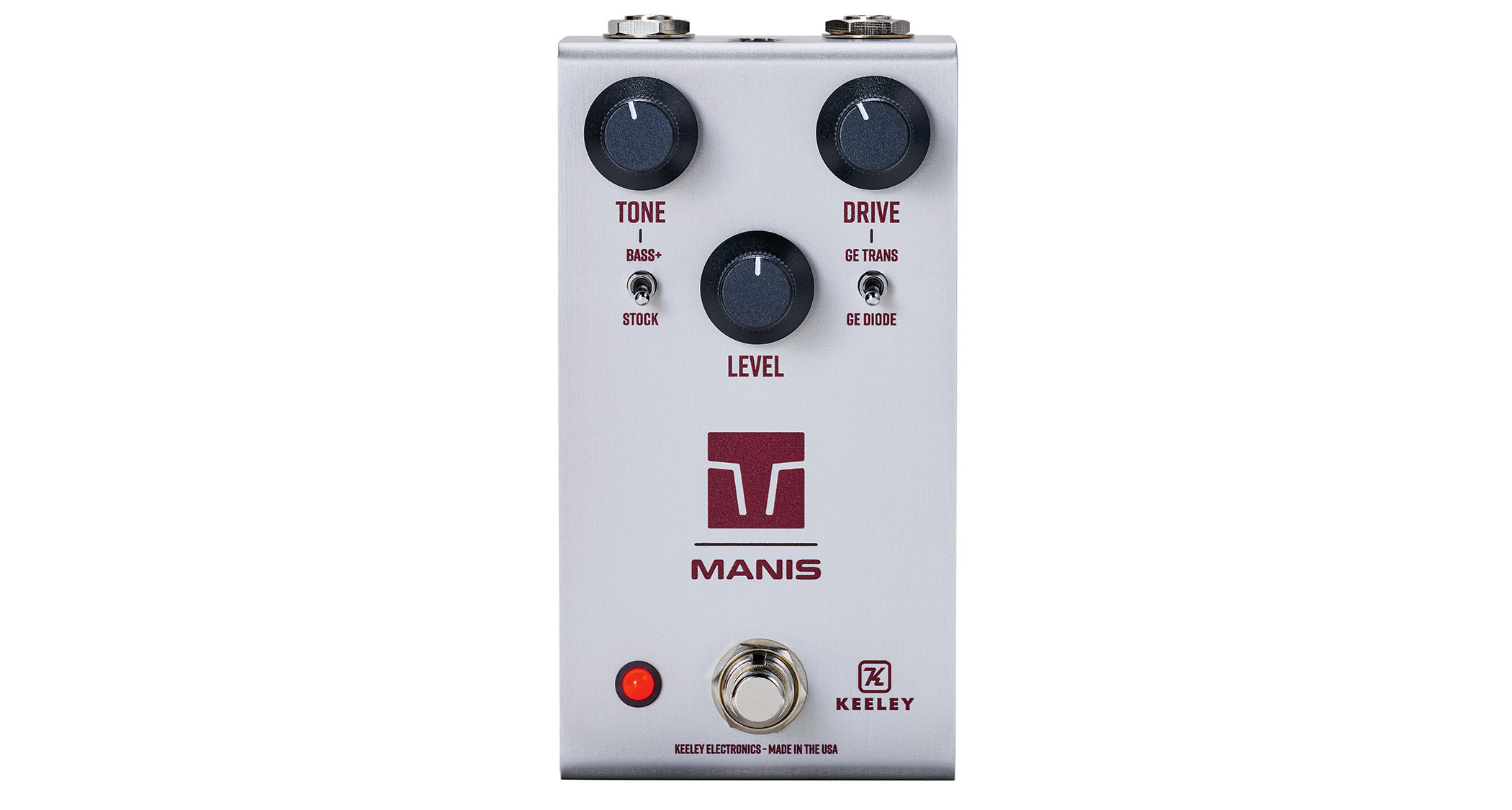 Keeley Electronics Manis: this ingenuous twist ont he K-style overdrive has three-knobs, a couple of mode switches, a tidy white finish and is photographed here against an amp with a red guitar cable.