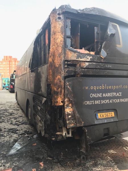 Aqua Blue Sport's damaged team bus at the Vuelta