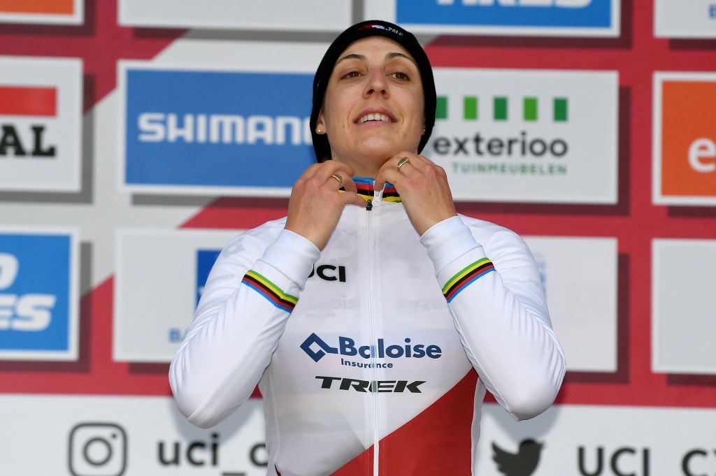 NAMUR BELGIUM DECEMBER 19 Lucinda Brand of The Netherland and Team Baloise Trek Lions celebrates winning the UCI WorldTour Leader Jersey on the podium ceremony after the 13th Namur UCI CycloCross Worldcup 2021 Womens Elite UCIWT on December 19 2021 in Namur Belgium Photo by Luc ClaessenGetty Images
