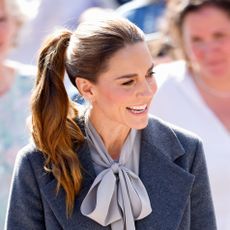 Kate Middleton wears a Chanel bag