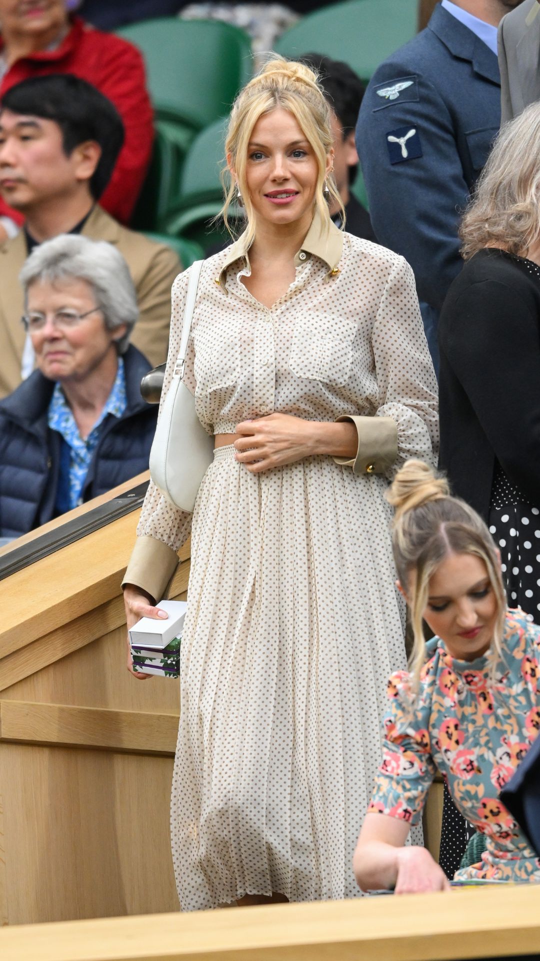 Sienna Miller attends Centre Court on day nine of the Wimbledon Tennis Championships in 2024