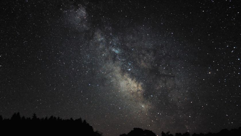 a wisp of white light crosses the night sky