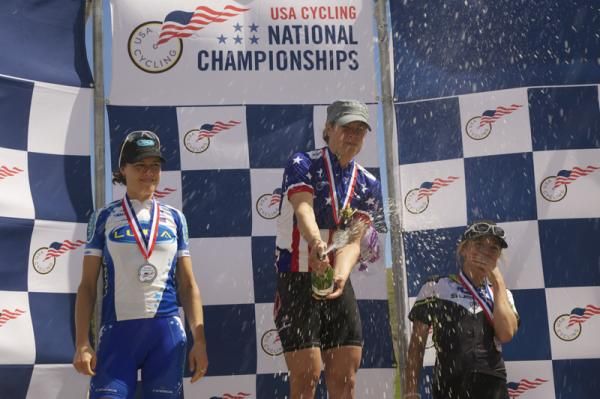 From left to right, Georgia Gould (Luna), Katie Compton (Planet Bike,Stevens, Kenda) Heather Irmiger (Subaru,Trek) lets the bubbly fly.