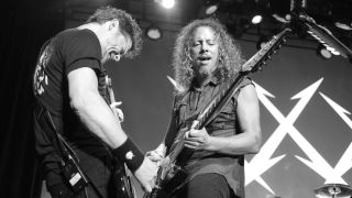 Jason Newsted (L) and Kirk Hammett of Metallica perform during night two of the band's 30th Anniversary at The Fillmore on December 7, 2011 in San Francisco, California