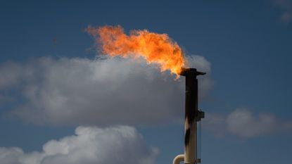 Excess natural gas burns off from an oil well near Tarzan, Texas.