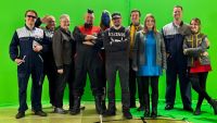 Actors in a Star Trek film stand in front of a green screen