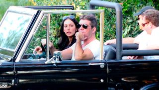 Simon Cowell and Lauren Silverman drive around LA in 2012