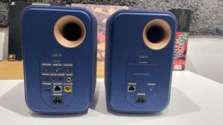KEF LSX II speakers in blue finish showing rear panel connections