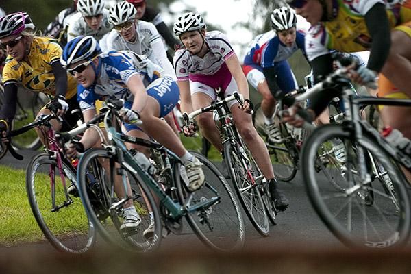 Loren Rowney (centre) from Queensland made the podium in the road race yesterday but settled deep in the peloton during the criterium.
