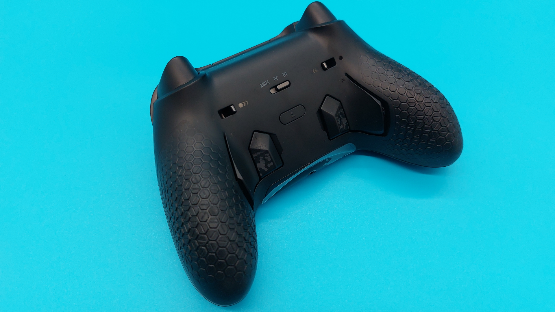 The Scuf Valor Pro wireless controller seen from various angles.