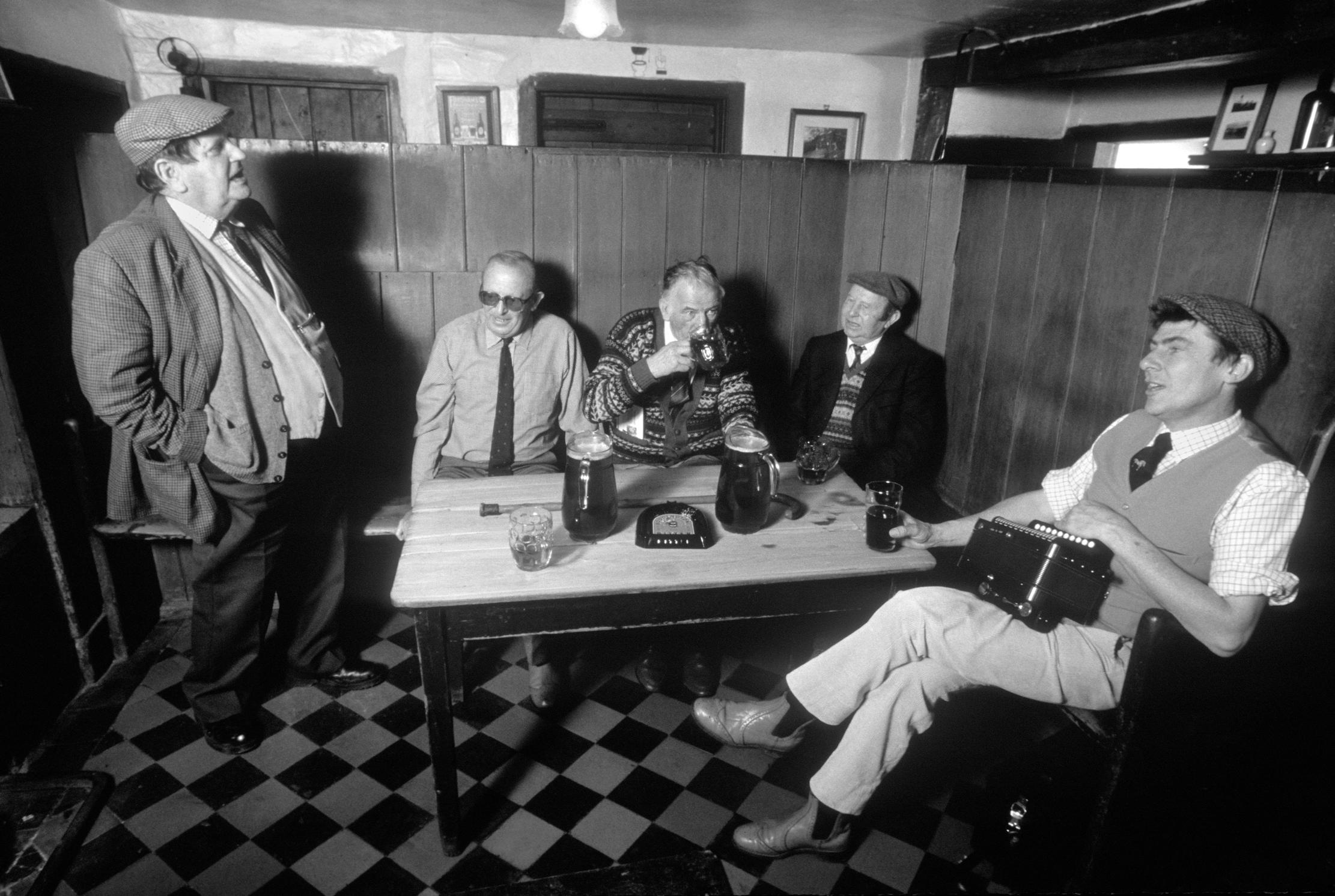 Men enjoy a drink in a suffolk pub