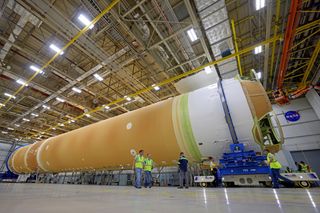 Teams at NASA’s Michoud Assembly Facility in New Orleans have fully integrated all five major structures of the Space Launch System rocket’s core stage for the Artemis 2 mission, which will send four astronauts around the moon in late 2024 and return them to Earth.
