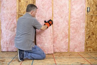 installing semi rigid insulation into walls