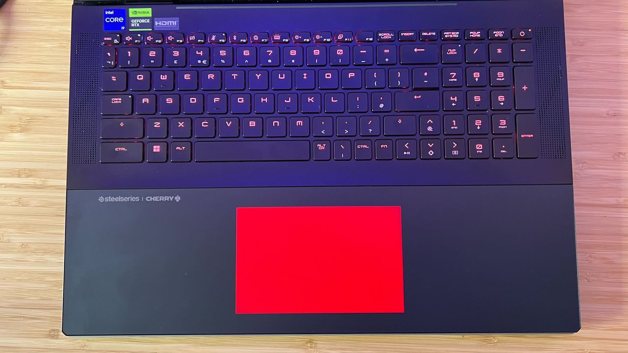 MSI Titan 18 HX keyboard and trackpad with RGB lighting showing
