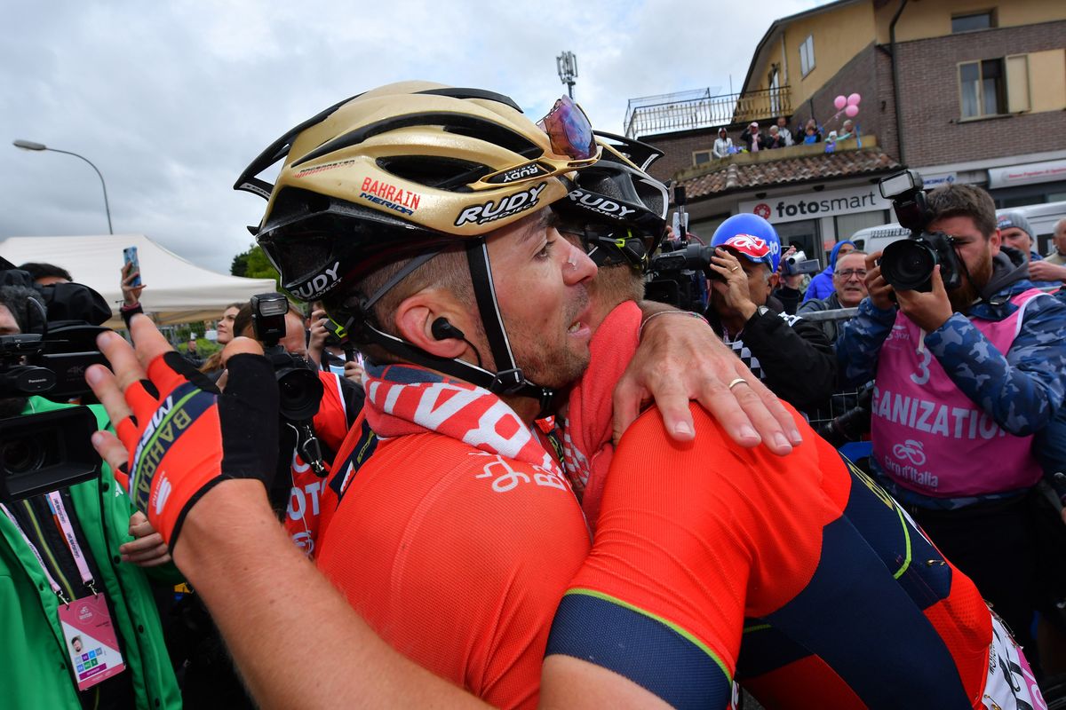 Matej Mohoric gets a hug from Giovanni Visconti