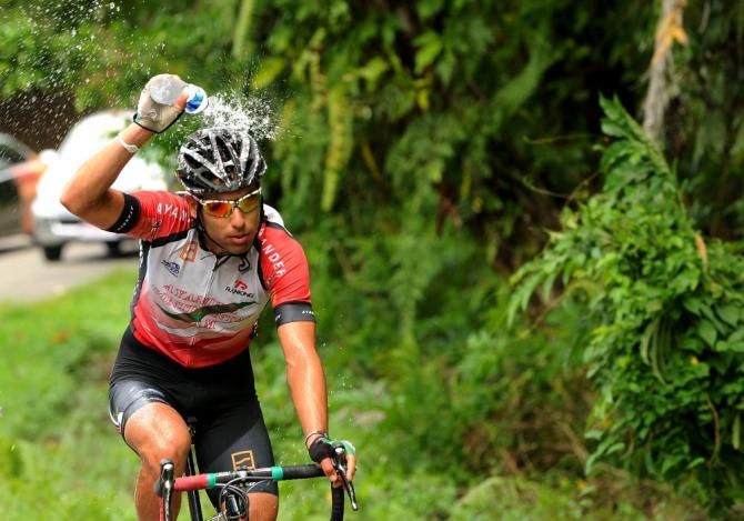 A Ayandeh Continental Team keeps himself cool on the longest day of the tour