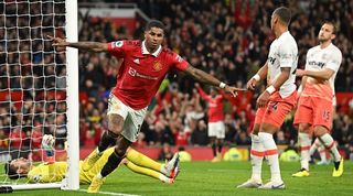 Marcus Rashford celebrates scoring against West Ham to register his 100th goal for Manchester United.