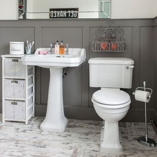 toilet with commode and wash basin