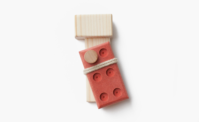 Brooch in wood, fibreboard, cotton and steel