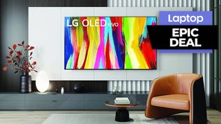 LG C2 OLED TV in a living room next to a brown leather chair