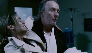Betsy Russell and Tobin Bell at the clinic in Saw IV.