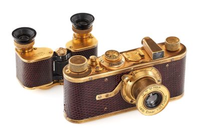 A gold and brown Leica camera