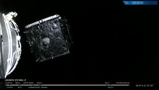 Qatar's Es'Hail-2 communications satellite (right) separates from the second stage of SpaceX's Falcon 9 rocket to enter an initial orbit in this view from a camera on the Falcon 9 stage taken after its Nov. 15, 2018 launch.