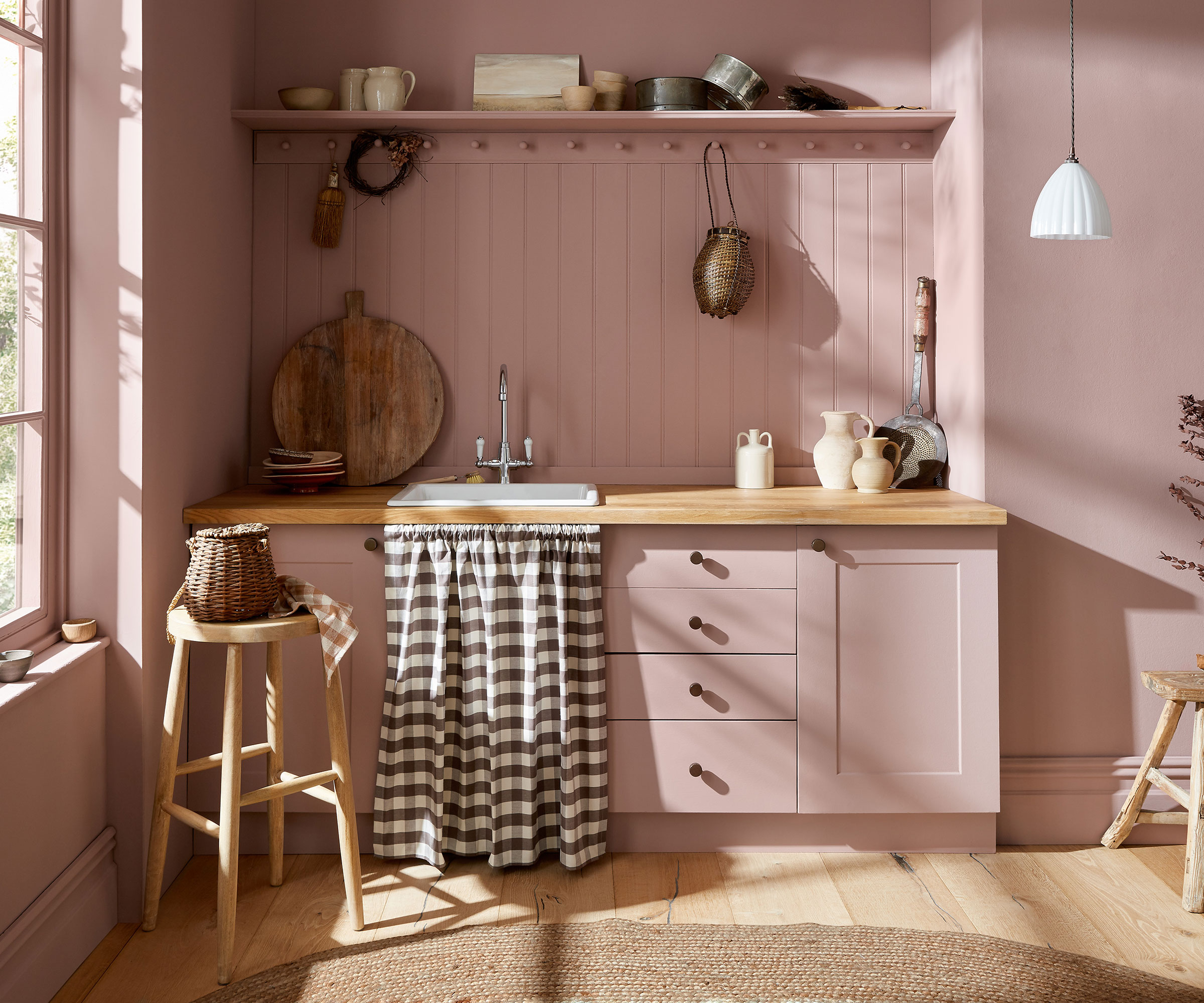 pretty pink farmhouse kitchen with colour drenching