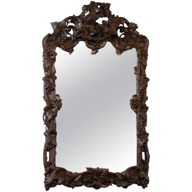 Large German Black Forest Carved Mirror With Bird Motif From the 19th Century